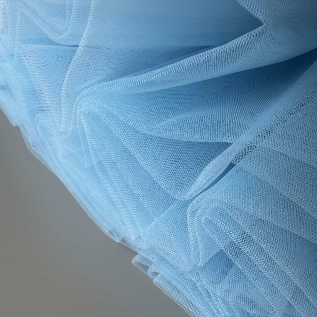 Close-up of soft Hayal tulle fabric in blue – premium handmade tutu skirt