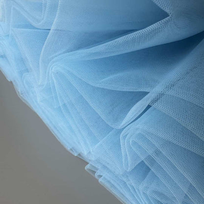 Close-up of soft Hayal tulle fabric in blue – premium handmade tutu skirt