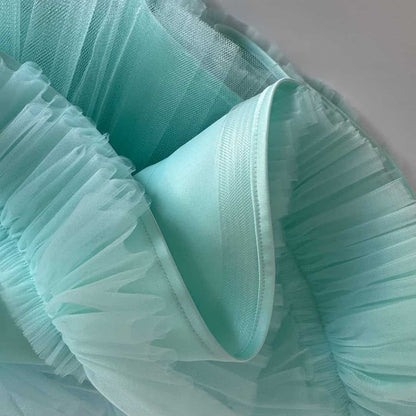 Fine crinoline used in tulle dress skirt for gentle structure and elegant shape