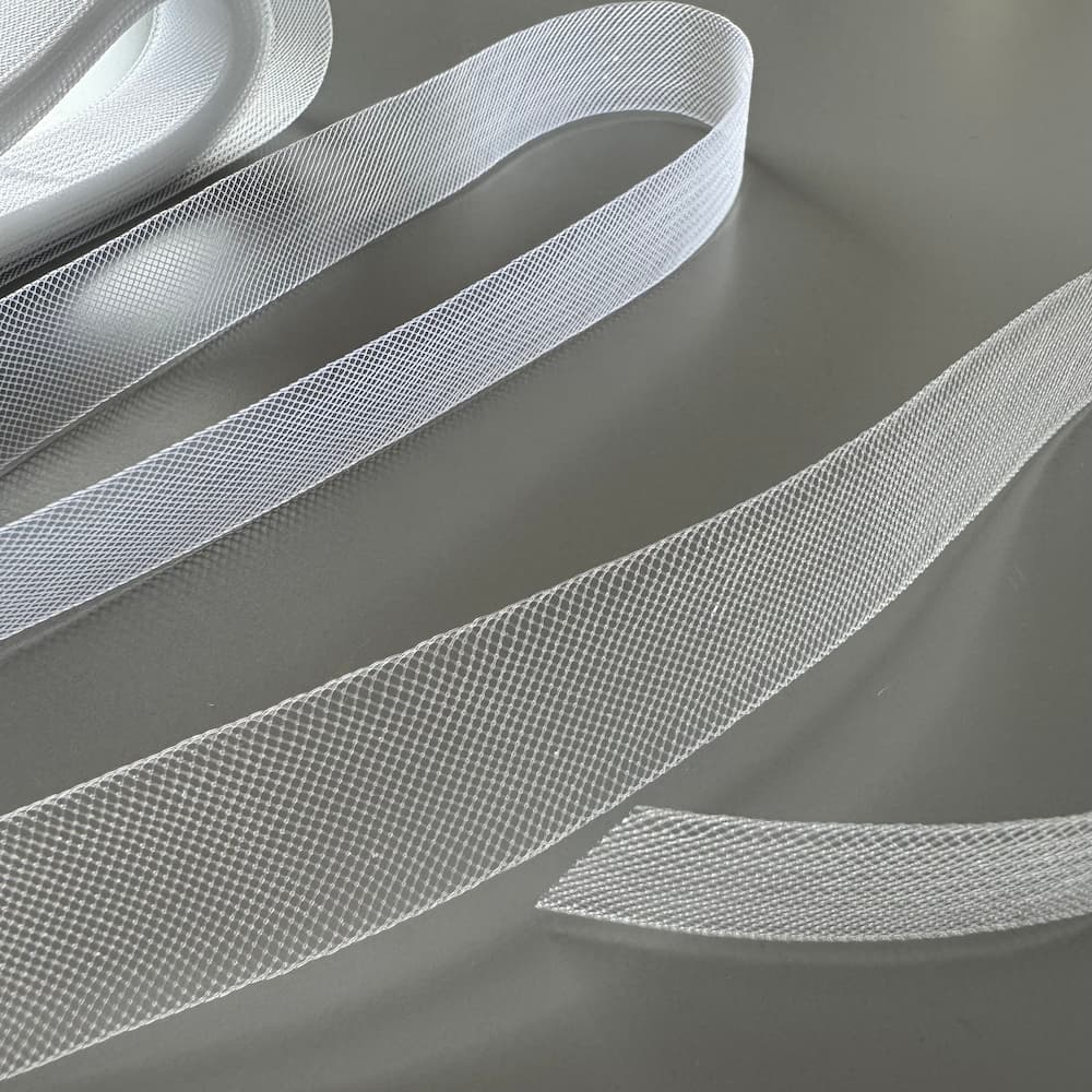 Close-up of fine and soft crinoline net band used for dressmaking and garment structure