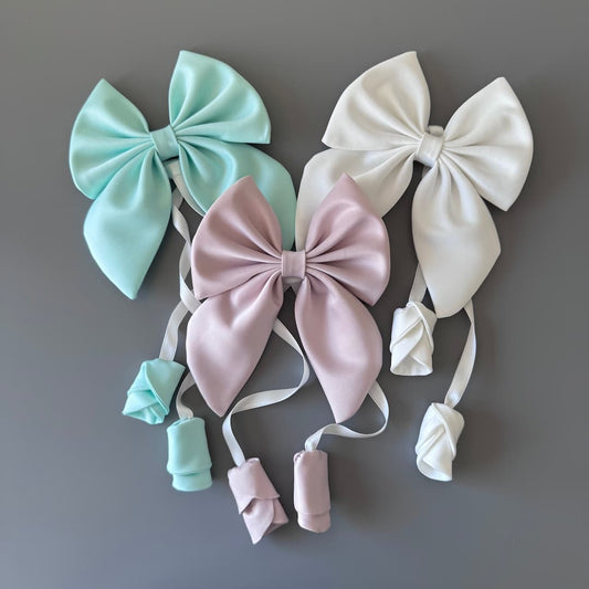 Handmade satin hair bows in off white, powder pink and mint for girls and women
