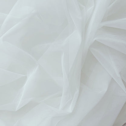 Offwhite tulle fabric texture – soft material for handmade dresses, skirts and hair accessories